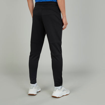 Black jogger pants back view with seam lines and tapered ankle cuffs