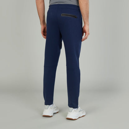 Men's navy jogger pants, back view with tapered legs and back pocket