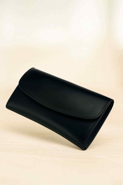 Black leather wallet with single front flap and rounded corners