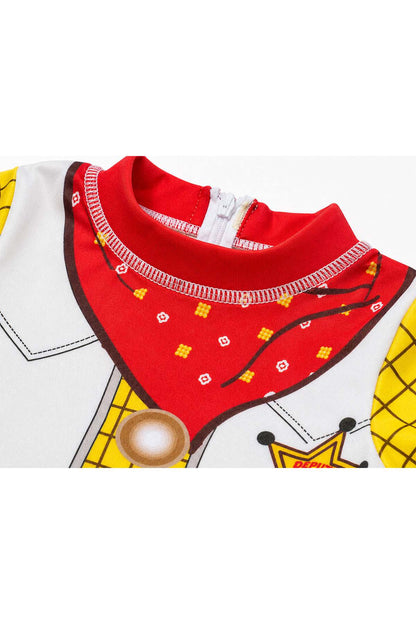BABYSHOP baby shirt with red collar, patterned chest, and yellow sleeves