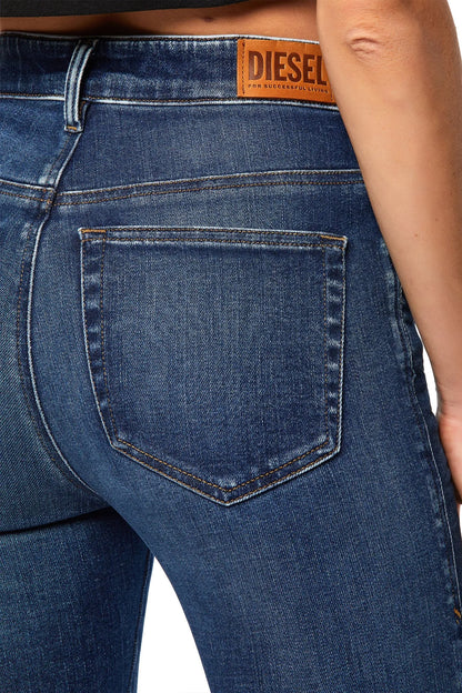 Blue denim jeans with stitched back yoke and large rear patch pocket