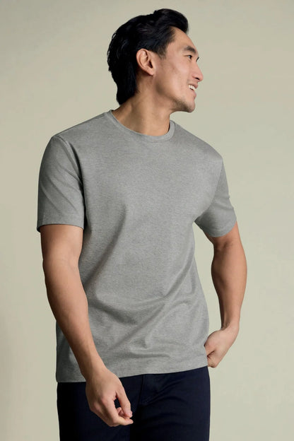 Grey crew-neck short-sleeve T-shirt, side view on model