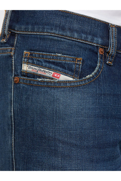 Blue denim jeans coin pocket with branded logo patch