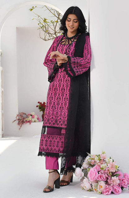 Magenta kurta dress with black dupatta draped over shoulder, knee-length