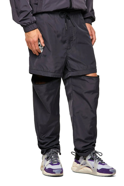 Dark navy drawstring pants with flap pockets and elastic ankle cuffs
