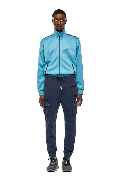 Diesel blue cargo jogger pants on model, full length with drawstring waist and pockets