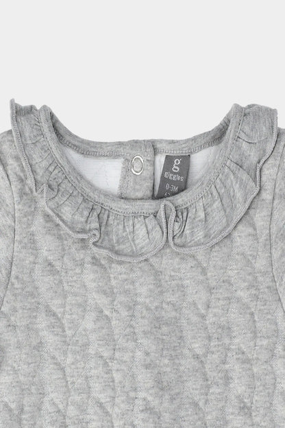 Grey baby dress close-up: round neck, small button placket, knit texture
