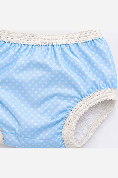 Blue dotted baby briefs close-up with elastic waistband and white leg cuffs