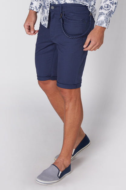 Navy blue knee-length shorts with curved front pocket and belt loops