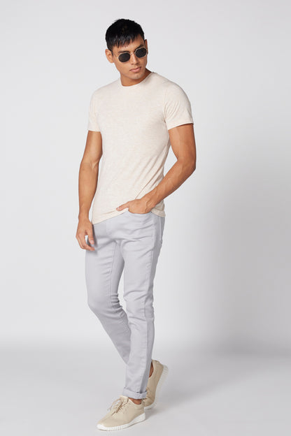 Light blue drawstring waist pants with tapered legs and front pockets
