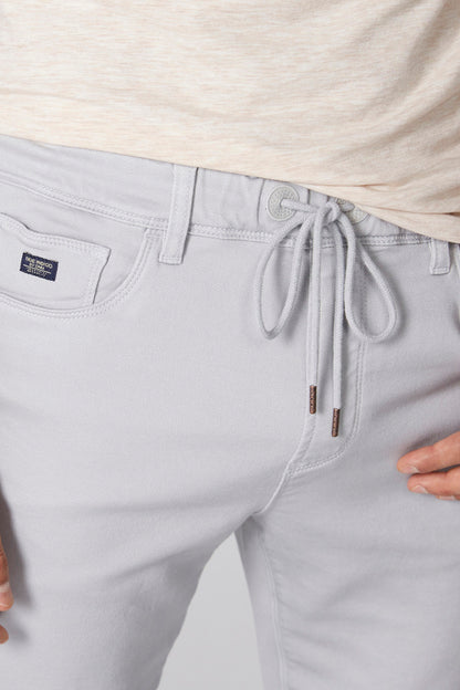 Light blue drawstring waist pants with front pockets and belt loops