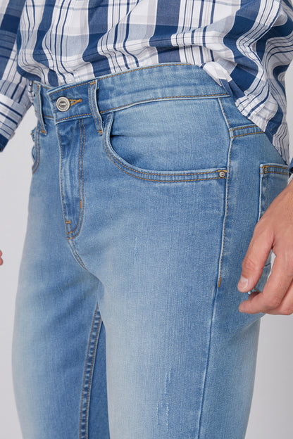 Light blue denim jeans with front coin pocket, stitched details, and button closure