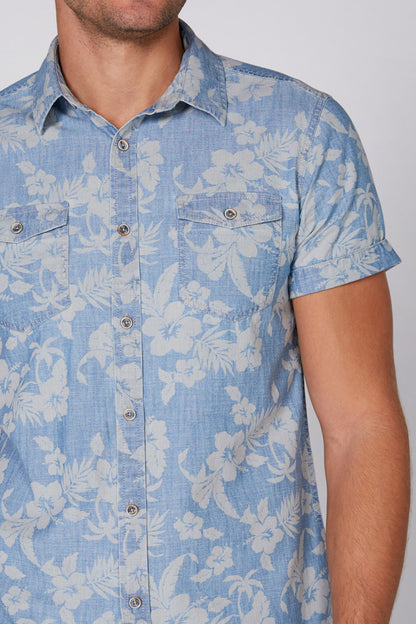 Blue floral short-sleeve button-up shirt close-up with button front and point collar