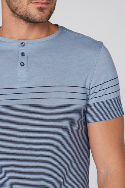 Men's blue striped henley shirt close-up, 3-button front placket and sleeve stripes