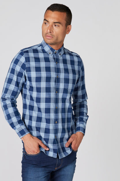 Blue and white plaid button-up shirt with long sleeves and button front