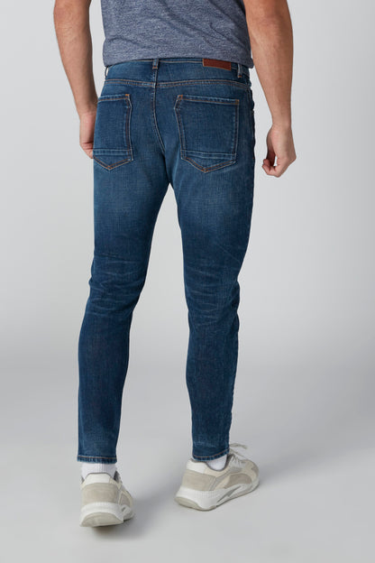 Splash blue denim jeans, rear view with belt loops and stitched back pockets