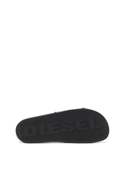 Black rubber slide sandals, textured underside tread