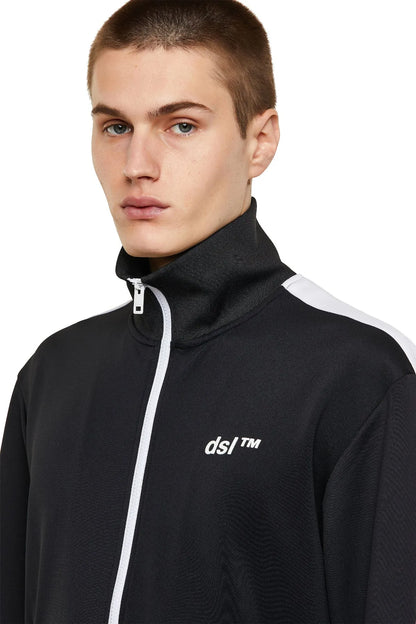 Black track jacket close-up with stand collar, white zipper and dsl™ logo
