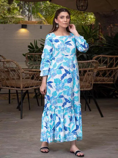 Light blue floral maxi dress with round neckline, 3/4 sleeves, and long skirt