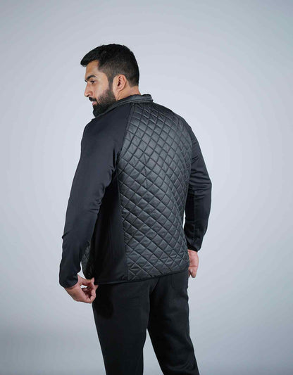 Black quilted zip-up jacket with diamond pattern, back view