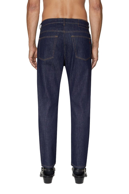 Diesel dark blue denim jeans back view with belt loops and rear pockets