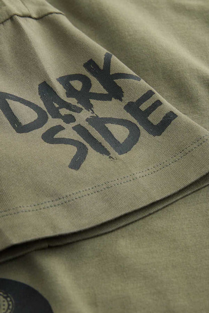 Olive green graphic T-shirt sleeve with 'DARK SIDE' print