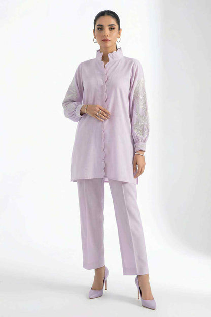Lilac button-front kurta with lace-trim design and straight pants, styled with sheer dupatta