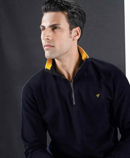 Men's dark navy half-zip pullover sweater with yellow-trim collar and chest logo