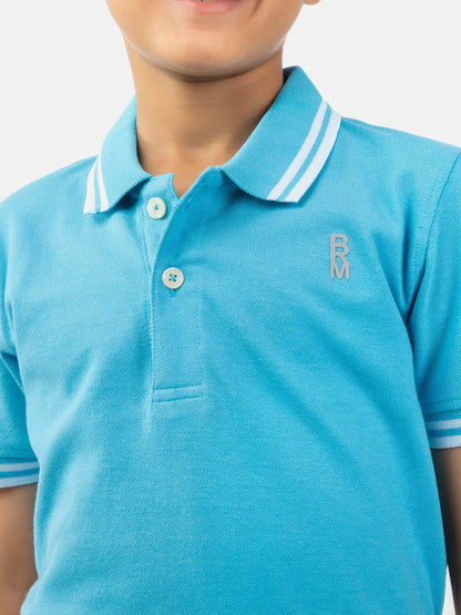 Light blue 100% cotton polo shirt front with button placket and embroidered logo