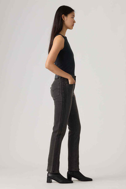 Levi's dark wash denim jeans with straight legs, side profile view