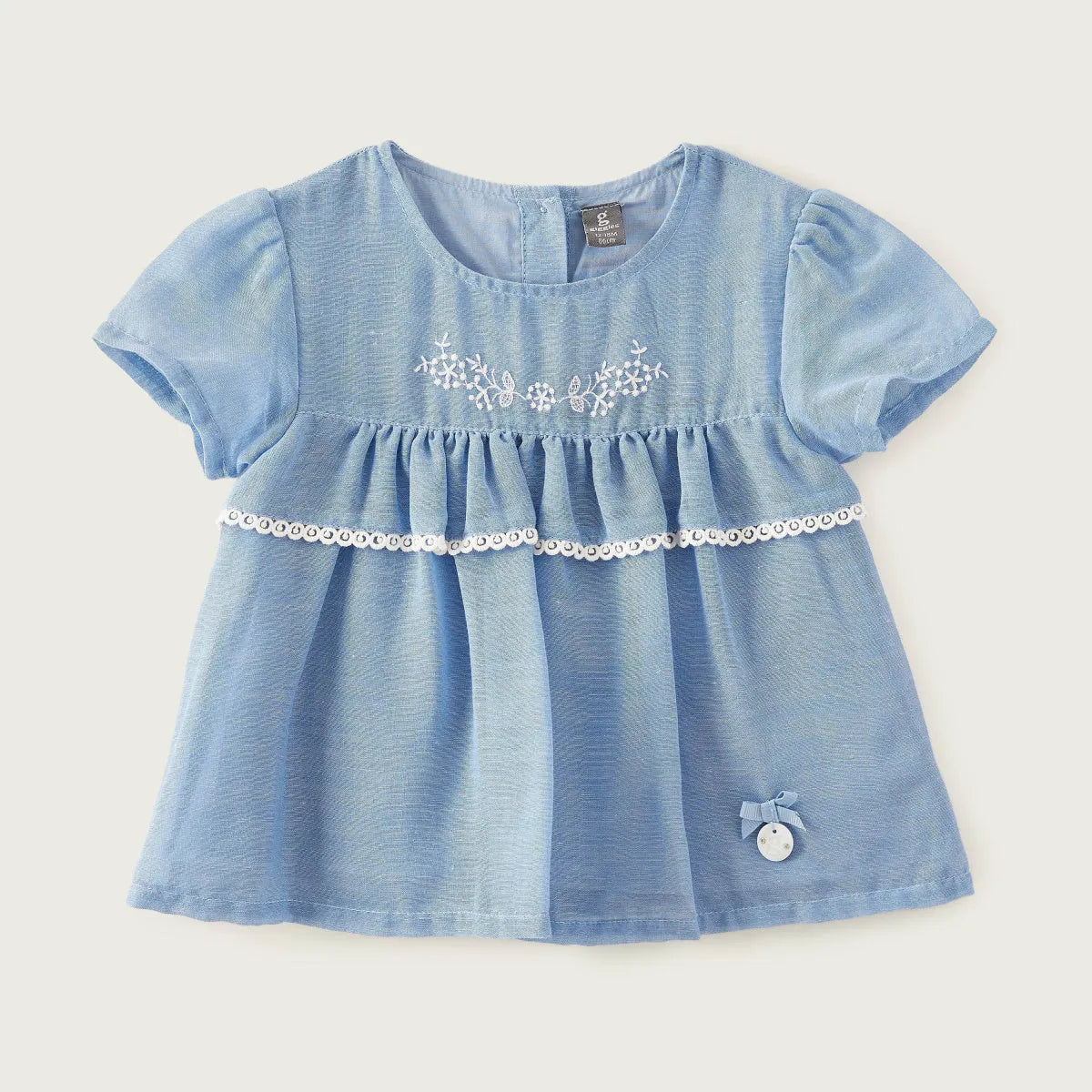 Blue baby dress with embroidered snowflake yoke, lace trim, short sleeves