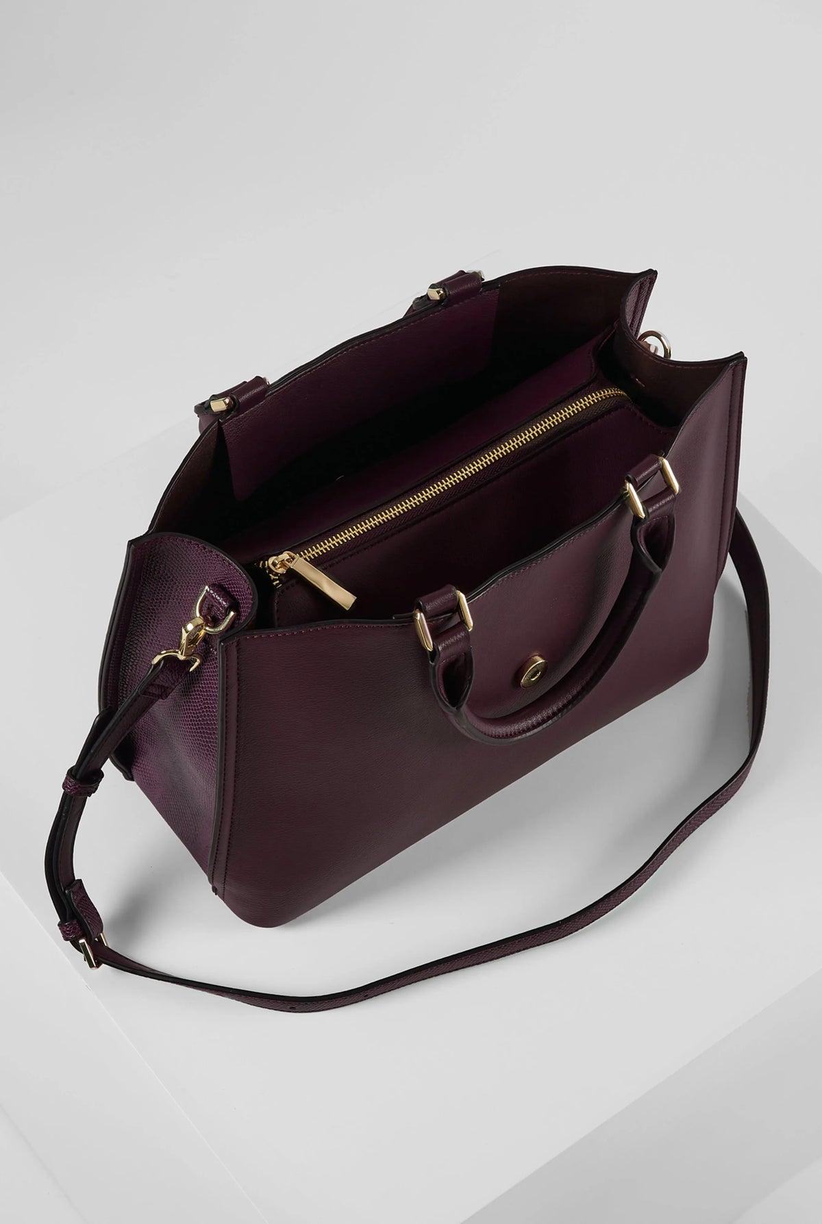 Luella Grey purple handbag with open top, gold zipper pocket, and adjustable strap