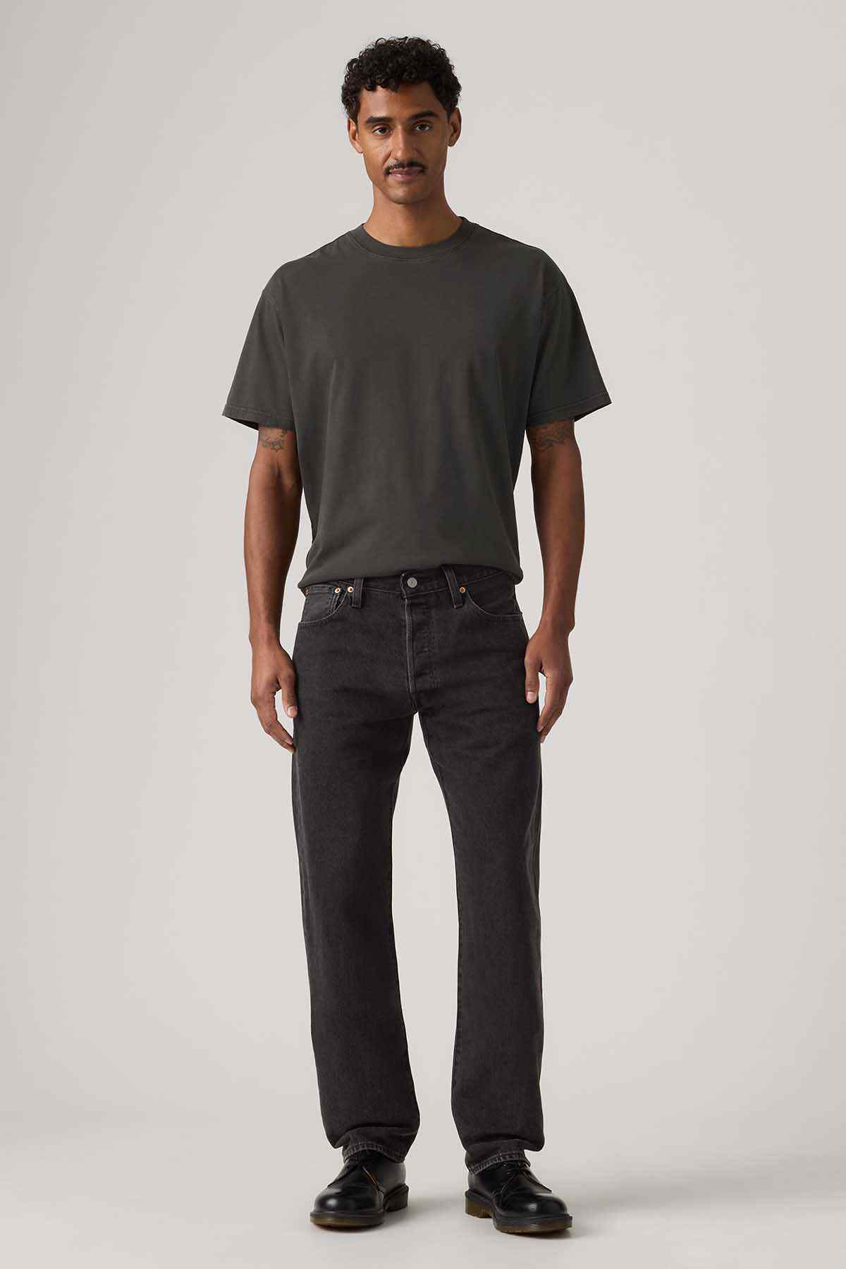 Levi's black jeans with straight leg and button fly, dark wash