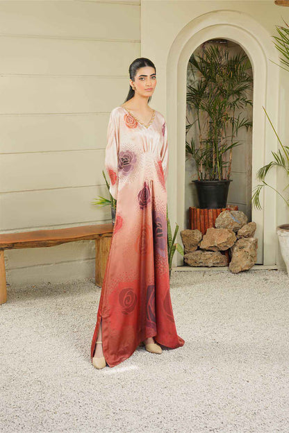 Blush pink maxi dress with long sleeves and flowing silhouette, maroon motif print