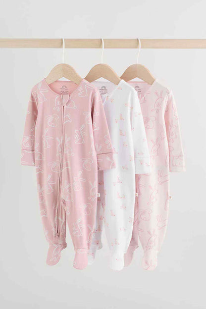 Pink and white hooded footed onesie pajamas on hangers, all-over animal print