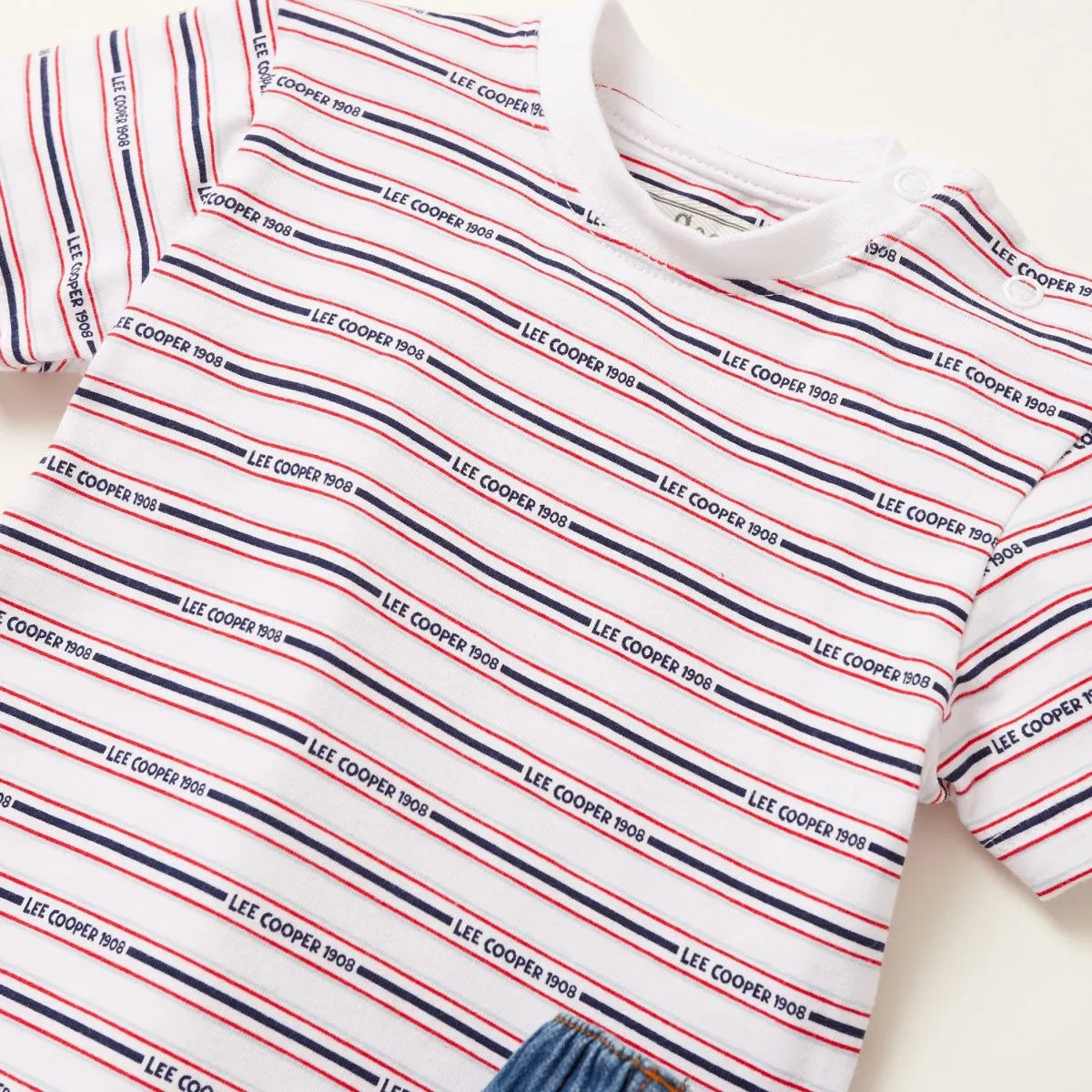 Striped T-shirt close-up with crew neck, white with red and navy lines