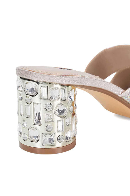 Jeweled block heel with square rhinestone embellishment on slide sandal