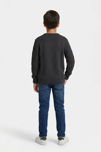 Black cable-knit crewneck sweater, back view, long sleeves