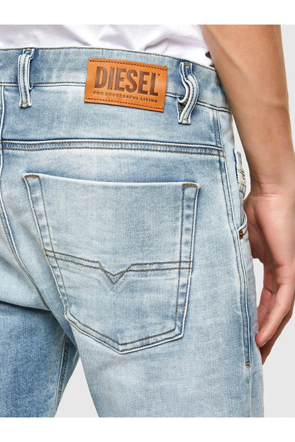 Diesel light blue denim jeans with DIESEL logo patch on waistband and rear pocket