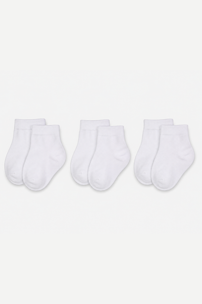 Set of white baby socks, ribbed cuff knit design