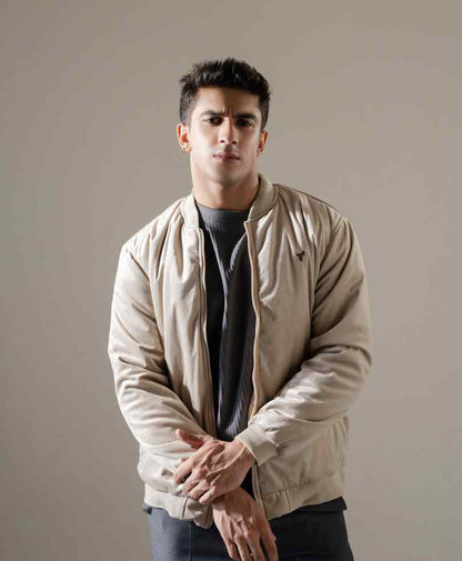 Men's beige zip-up bomber jacket with ribbed collar, cuffs, and subtle logo on chest