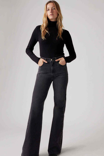 Levi's black bootcut jeans with button waistband and five-pocket design