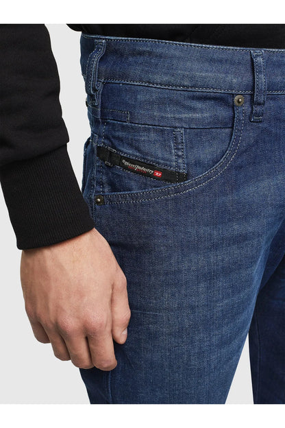 Blue denim jeans front detail with coin pocket, button waist, and belt loops