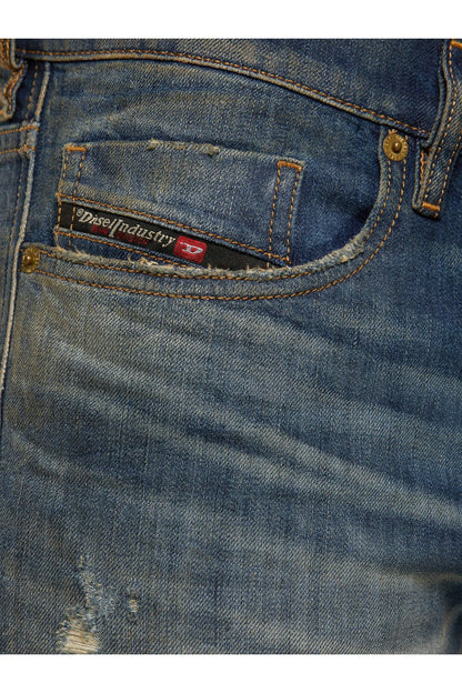 Blue jeans coin pocket with stitched logo patch and orange trim