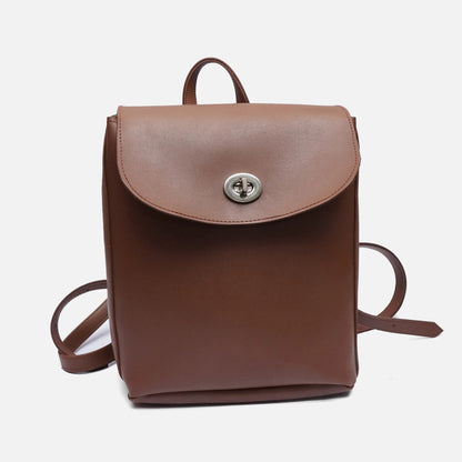 Brown leather mini backpack with front flap and round clasp, plus adjustable shoulder strap.