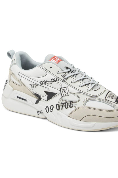 White low-top sneakers, side view with black graphic panels