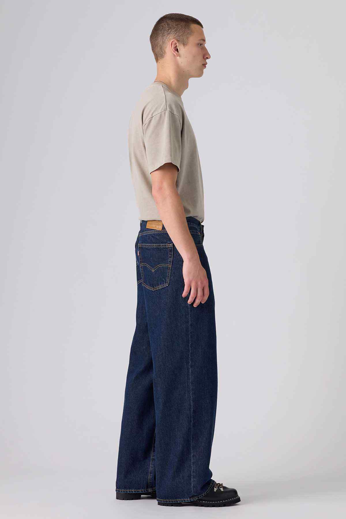 Dark wash denim jeans with straight fit and contrast-stitched back pockets