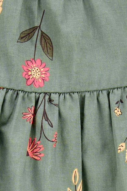 Green fabric with pink and brown floral print and tiered ruffle seam