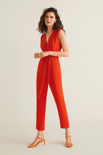 Coral red sleeveless V-neck belted jumpsuit with straight-leg cropped fit