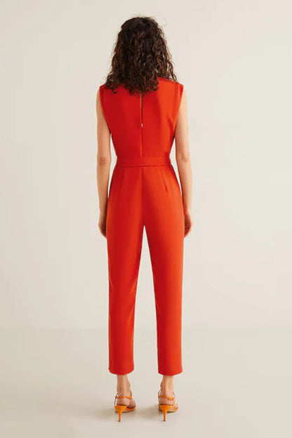 Coral red sleeveless belted jumpsuit with open back and cropped legs
